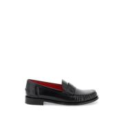 Salvatore Ferragamo Loafers i läder med präglad logotyp Black, Dam
