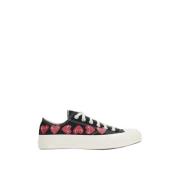 Comme des Garçons Play Svarta Converse Låga Sneakers med Hjärttryck Bl...