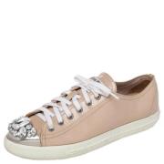 Miu Miu Pre-owned Pre-owned Laeder sneakers Beige, Dam