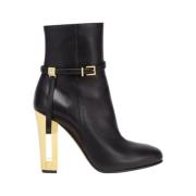 Fendi Svarta Delfina ankelboots i läder med guld stilettklack Black, D...