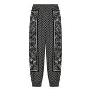 Balmain Svarta Viskos Avslappnade Byxor med Mini Monogramtryck Black, ...