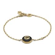 Gucci Interlocking armband i gult guld, onyx och diamant Yellow, Dam