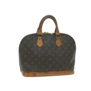 Louis Vuitton Vintage Pre-owned Belagd canvas handvskor Brown, Dam