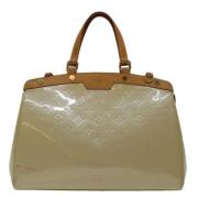 Louis Vuitton Vintage Pre-owned Laeder handvskor Beige, Dam