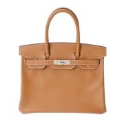 Hermès Vintage Pre-owned Tyg handvskor Beige, Dam