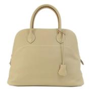 Hermès Vintage Pre-owned Laeder handvskor Beige, Dam