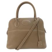 Hermès Vintage Pre-owned Laeder handvskor Beige, Dam