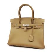 Hermès Vintage Pre-owned Tyg handvskor Beige, Dam