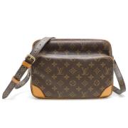 Louis Vuitton Vintage Pre-owned Canvas axelremsvskor Brown, Dam