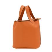 Hermès Vintage Pre-owned Laeder handvskor Orange, Dam