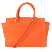 Michael Kors Pre-owned Pre-owned Plast handvskor Orange, Dam