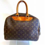 Louis Vuitton Vintage Pre-owned Canvas handvskor Brown, Dam