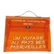 Hermès Vintage Pre-owned Vinyl handvskor Orange, Dam