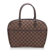 Louis Vuitton Vintage Pre-owned Canvas handvskor Brown, Dam