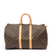 Louis Vuitton Vintage Pre-owned Belagd canvas resvskor Brown, Dam