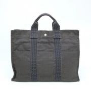 Hermès Vintage Pre-owned Canvas handvskor Gray, Dam