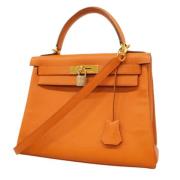 Hermès Vintage Pre-owned Laeder handvskor Orange, Dam