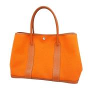 Hermès Vintage Pre-owned Canvas handvskor Orange, Dam