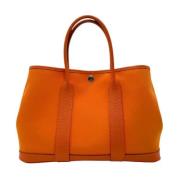 Hermès Vintage Pre-owned Canvas handvskor Orange, Dam