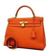 Hermès Vintage Pre-owned Laeder handvskor Orange, Dam