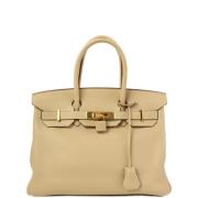 Hermès Vintage Pre-owned Tyg handvskor Beige, Dam