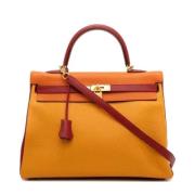 Hermès Vintage Pre-owned Laeder handvskor Yellow, Dam