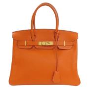 Hermès Vintage Pre-owned Laeder handvskor Orange, Dam