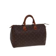 Louis Vuitton Vintage Pre-owned Canvas handvskor Brown, Dam