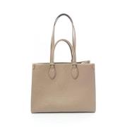 Louis Vuitton Vintage Pre-owned Tyg totevskor Beige, Dam