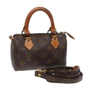 Louis Vuitton Vintage Pre-owned Canvas handvskor Brown, Dam