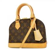 Louis Vuitton Vintage Pre-owned Tyg handvskor Brown, Dam