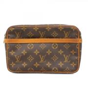 Louis Vuitton Vintage Pre-owned Tyg kuvertvskor Brown, Dam