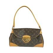 Louis Vuitton Vintage Pre-owned Tyg axelremsvskor Brown, Dam