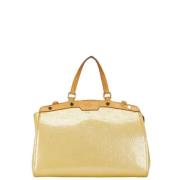 Louis Vuitton Vintage Pre-owned Laeder handvskor Beige, Dam