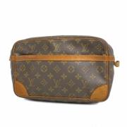 Louis Vuitton Vintage Pre-owned Tyg kuvertvskor Brown, Dam