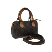 Louis Vuitton Vintage Pre-owned Canvas handvskor Brown, Dam