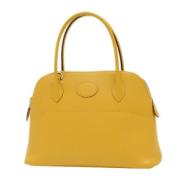 Hermès Vintage Pre-owned Laeder handvskor Yellow, Dam