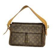 Louis Vuitton Vintage Pre-owned Canvas axelremsvskor Brown, Dam