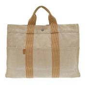 Hermès Vintage Pre-owned Canvas handvskor Beige, Dam