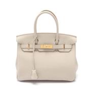 Hermès Vintage Pre-owned Laeder handvskor Beige, Dam