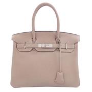 Hermès Vintage Pre-owned Laeder handvskor Beige, Dam