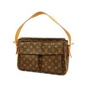 Louis Vuitton Vintage Pre-owned Canvas axelremsvskor Brown, Dam