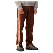 Drole de Monsieur Bruna Sweatpants med Orange Mönster Brown, Herr