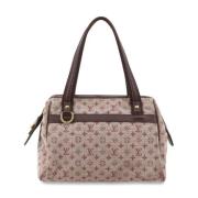 Louis Vuitton Vintage Pre-owned Tyg axelremsvskor Red, Dam