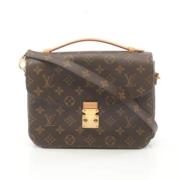 Louis Vuitton Vintage Pre-owned Plast handvskor Brown, Dam