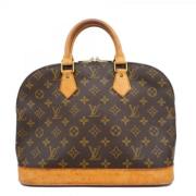 Louis Vuitton Vintage Pre-owned Tyg handvskor Brown, Dam