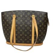 Louis Vuitton Vintage Pre-owned Canvas axelremsvskor Brown, Dam