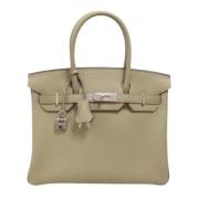 Hermès Vintage Pre-owned Laeder handvskor Beige, Dam