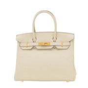 Hermès Vintage Pre-owned Laeder handvskor Beige, Dam