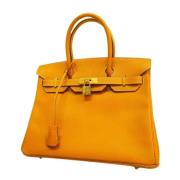 Hermès Vintage Pre-owned Laeder handvskor Orange, Dam